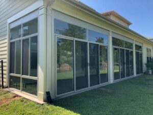 Modern sunroom with large glass windows