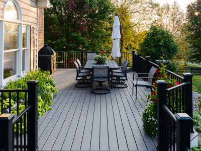 Custom-built composite deck in Fallston, MD with built-in seating and railing