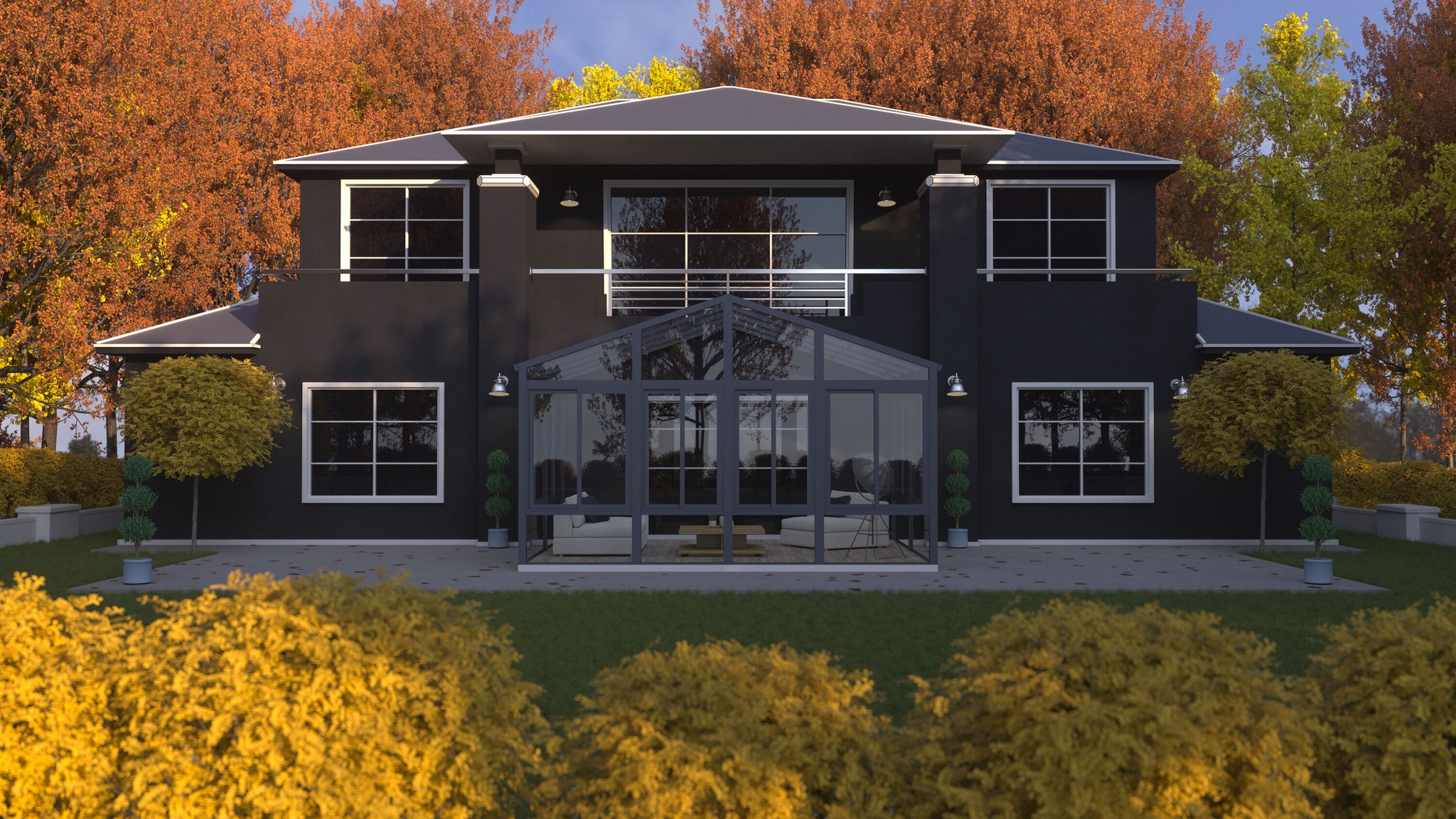 Modern house with glass extension in autumn.